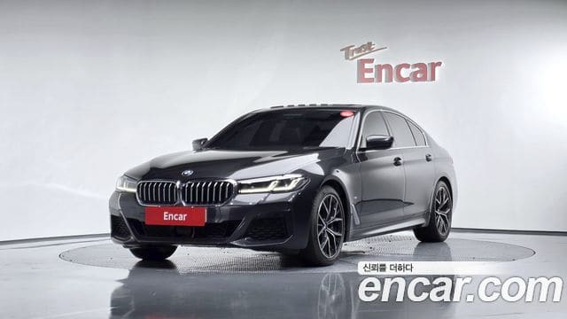 BMW 5 Series — фото 1