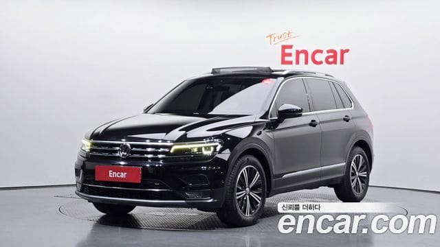 Volkswagen Tiguan — фото 1