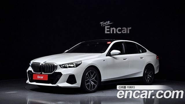 BMW 5 Series — фото 1