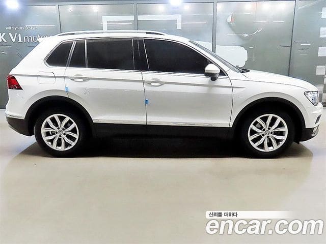 Volkswagen Tiguan — фото 1