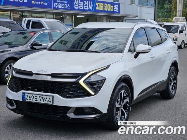 Kia Sportage — фото 1