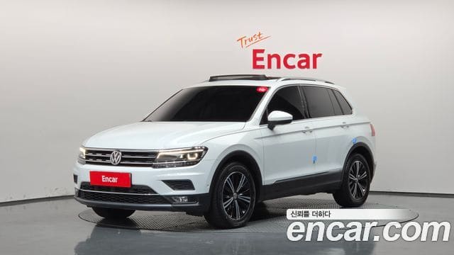 Volkswagen Tiguan — фото 1