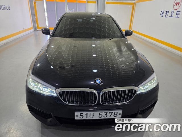 BMW 5 Series — фото 1