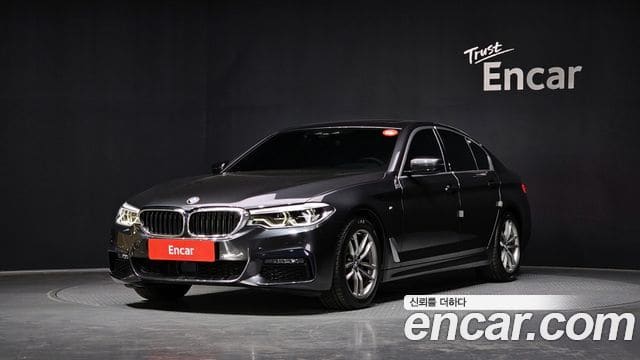 BMW 5 Series — фото 1