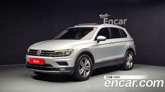 Volkswagen Tiguan — фото 1