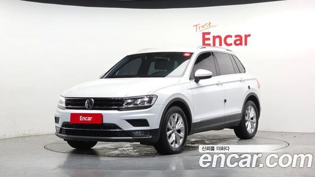 Volkswagen Tiguan — фото 1