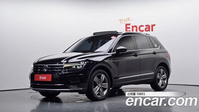 Volkswagen Tiguan — фото 1